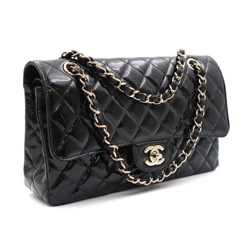 chanel black classic quilted handbag price|Chanel black bag with chain.